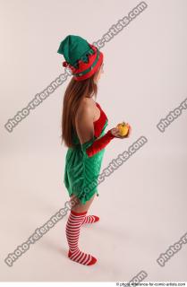 Veronika Elf Pose With Apple